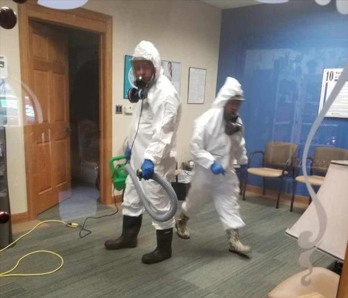 SERVPRO techs disinfecting medical facility