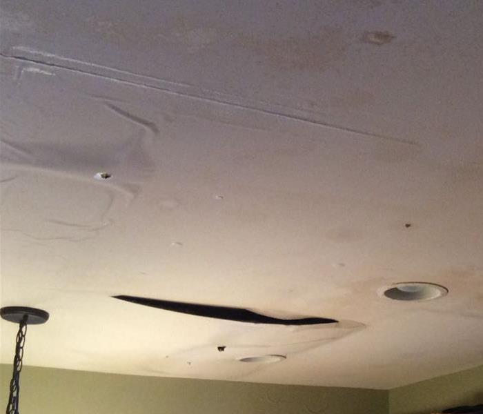 Ceiling has bubbles in it from water damage