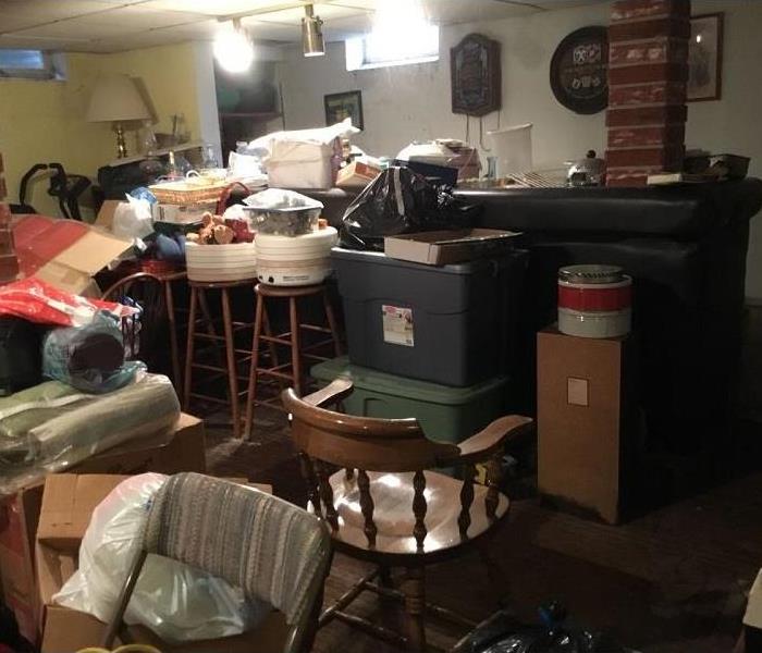 Basement rec room loaded with contents and mold