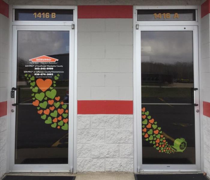 SERVPRO office doors decorated with paper hearts